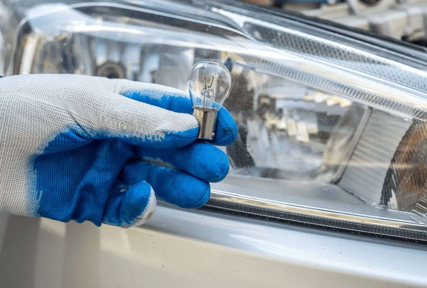 How much does a headlight bulb replacement cost? Bumper