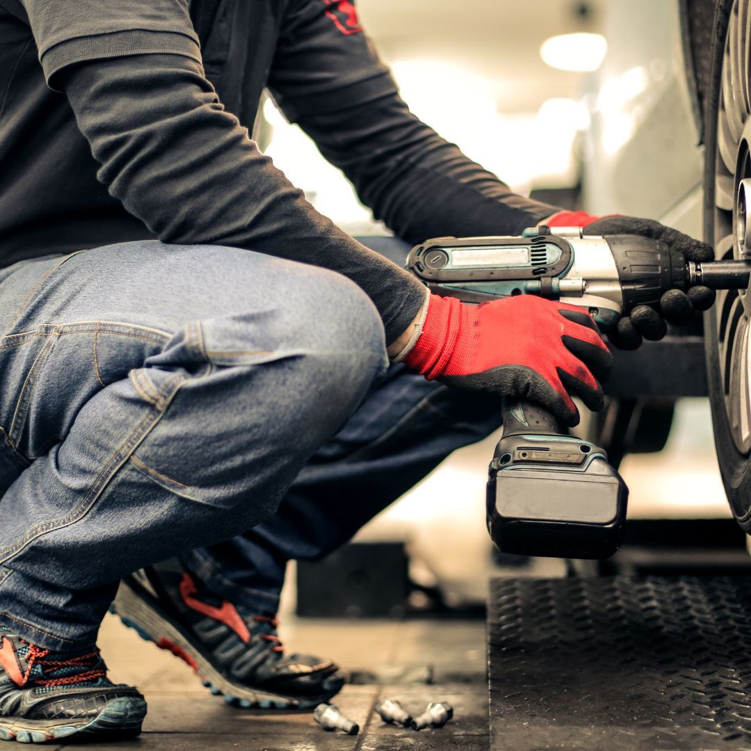 tightening wheel nuts on a car